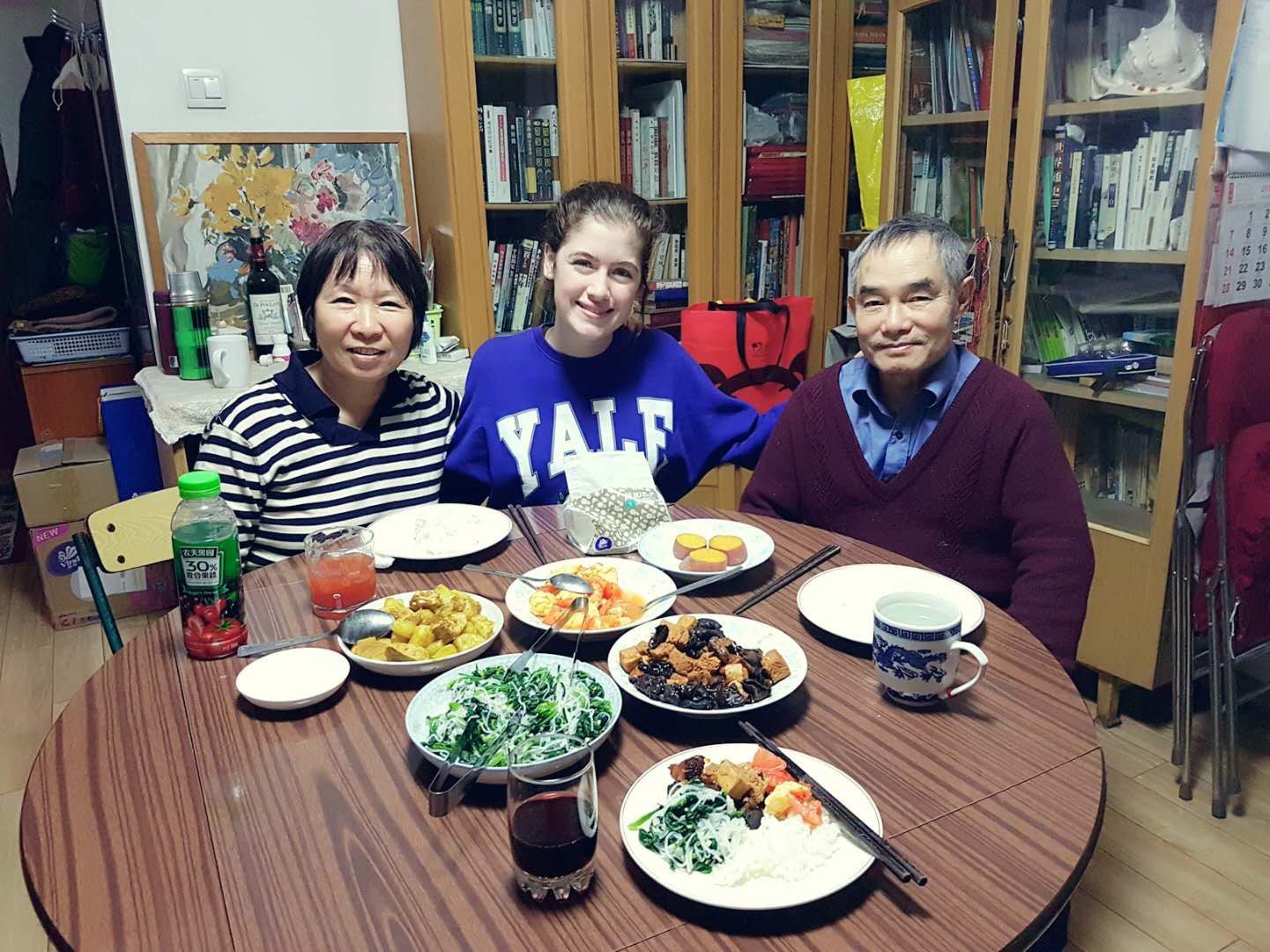 Savannah con su familia anfitriona en Pekín